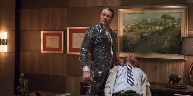 Hannibal (Mads Mikkelsen) dons some fancy plastic clothes for 'Buffet Froid'